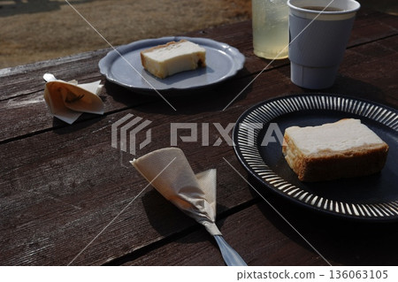 A sweet image of cheesecake for two lined up on a wooden table. A sweet image of cheesecake for two lined up on a wooden table. 136063105