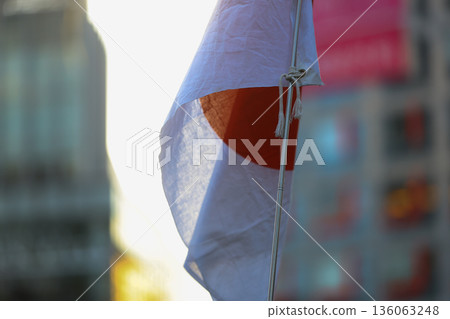[Japanese flag] The flag fluttering against the winter sky 136063248