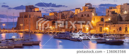 Castellammare del Golfo harbor and buildings at sunset in Sicily Italy Castellammare del Golfo harbor and buildings at sunset in Sicily Italy 136063566