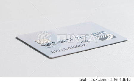 Image of a credit card with an IC chip placed on a white background Image of a credit card with an IC chip placed on a white background 136063612