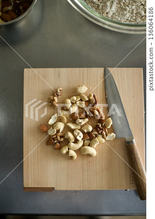 Cutting nuts to size for granola Cutting nuts to size for granola 136064186