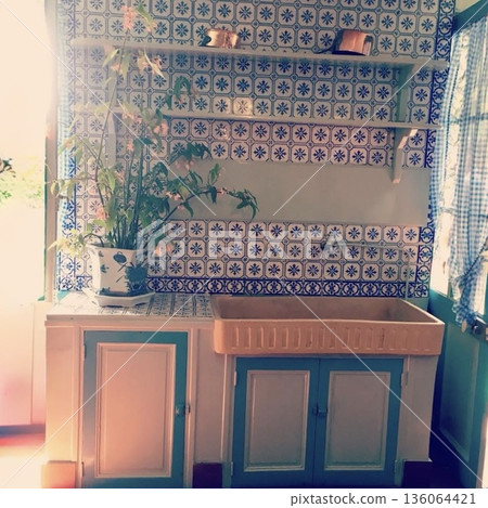 Monet's House in Giverny, France: Beautiful blue and white tiled kitchen and antique sink 136064421