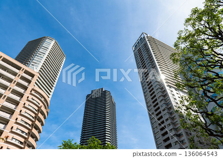 Tower apartment buildings line the streets of Chuo Ward, Tokyo Tower apartment buildings line the streets of Chuo Ward, Tokyo 136064543