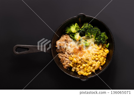 Broccoli, corn, tuna and cheese grilled 136065071