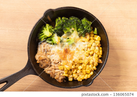 Broccoli, corn, tuna and cheese grilled 136065074