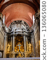 Igreja Sao Domingos Lisbon fire damaged church interior red vaulted ceiling stone columns golden altar historic cathedral Portugal. High quality photo 136065080