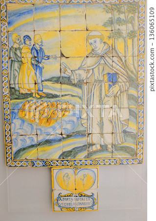 St Anthony chapel details wrought iron gates corridor stair tile panel and information plaques inside historic complex Lisbon Portugal editorial set. High quality photo St Anthony chapel details wrought iron gates corridor stair tile panel and information plaques inside historic complex Lisbon Portugal editorial set. High quality photo 136065109