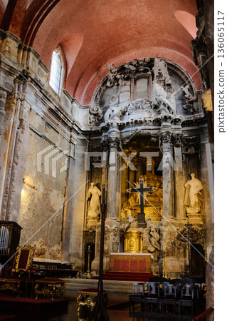 Igreja Sao Domingos Lisbon fire damaged church interior red vaulted ceiling stone columns golden altar historic cathedral Portugal. High quality photo 136065117