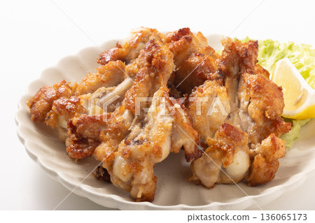 Opened and deep-fried chicken wings Opened and deep-fried chicken wings 136065173