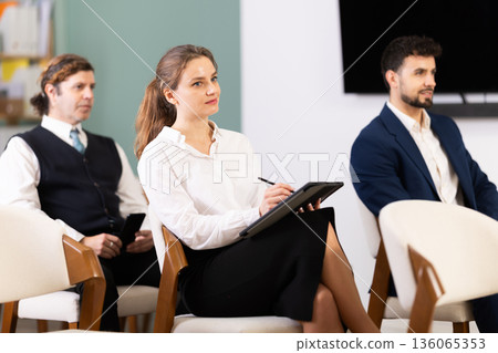 Group of businessmen participating in professional training class Group of businessmen participating in professional training class 136065353