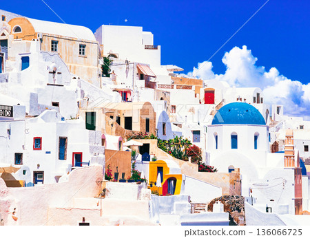 The white cityscape of Santory Island perched on a cliff 136066725