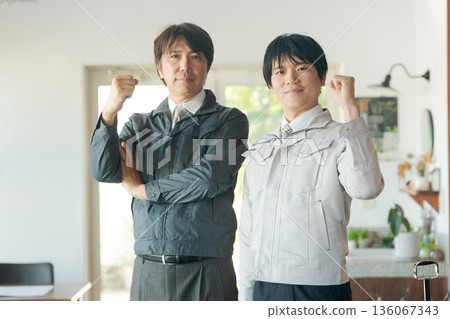 Men of work clothes in guts pose 136067343