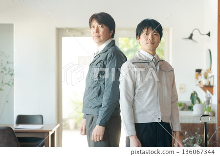 Portrait of man in work clothes 136067344