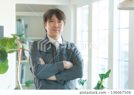 Portrait of man in work clothes 136067508
