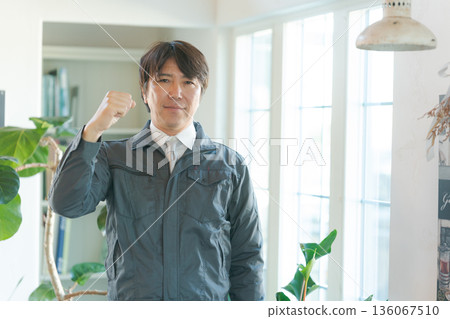 Portrait of man in work clothes 136067510