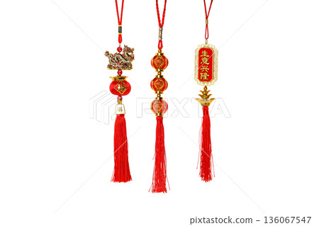 Three traditional red decorations hanging with tassels, isolated, PNG Three traditional red decorations hanging with tassels, isolated, PNG 136067547