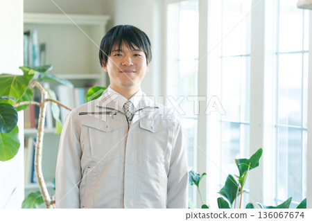 young man in work clothes 136067674