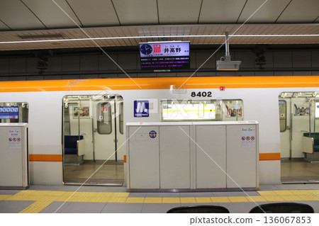 A train bound for Itakano stops at Imazato Station on the Osaka Metro Imazatosuji Line. A train bound for Itakano stops at Imazato Station on the Osaka Metro Imazatosuji Line. 136067853