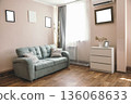 Cozy hotel room with a light pink wall, a green sofa, and a white dresser. Natural light streams through a large window, creating a welcoming atmosphere. 136068633