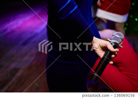 Intimate performance scene, Candid moment of performer amidst lively nightlife background, Confident singer showcased in dim neon lighting with friends enjoying performance Intimate performance scene, Candid moment of performer amidst lively nightlife background, Confident singer showcased in dim neon lighting with friends enjoying performance 136069156