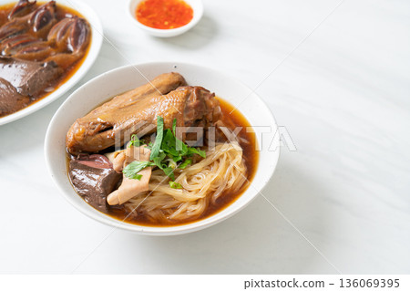 Braised duck noodles with brown soup Braised duck noodles with brown soup 136069395