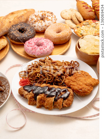 Examples of high-calorie dishes that may cause lifestyle-related diseases (fried foods) 136069434