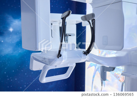 Futuristic clinic with advanced scanner, High-tech dental CT scanner in sleek clinic setting, Cutting-edge dental imaging equipment within futuristic clinic environment Futuristic clinic with advanced scanner, High-tech dental CT scanner in sleek clinic setting, Cutting-edge dental imaging equipment within futuristic clinic environment 136069565