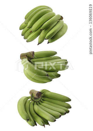 Raw banana isolated on a white background Raw banana isolated on a white background 136069819