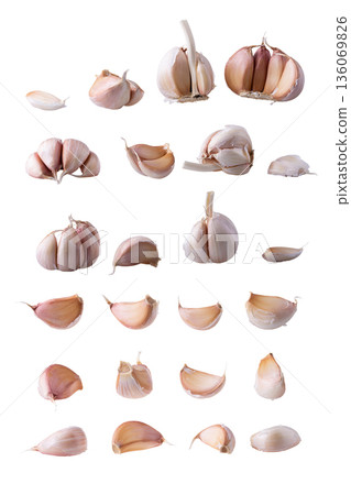 Close up raw garlic isolated on a white background Close up raw garlic isolated on a white background 136069826