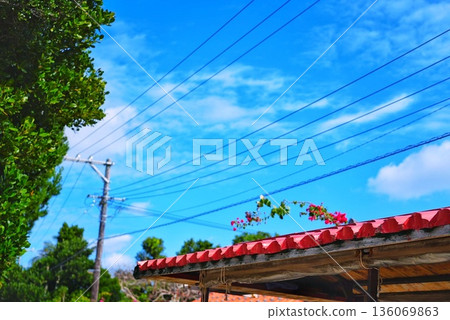 Blue sky and red tile roof Blue sky and red tile roof 136069863