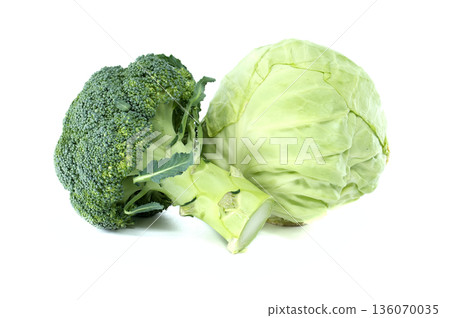 Fresh broccoli and green cabbage heads isolated on a clean white background Fresh broccoli and green cabbage heads isolated on a clean white background 136070035
