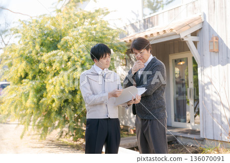 Image of people building a house 136070091