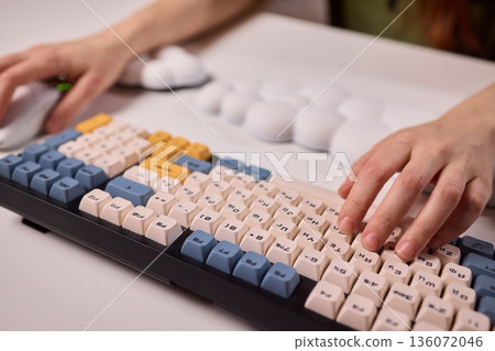 Keyboard setup showcase, Ergonomic mechanical keyboard display, Closeup of tactile switches on custom keyboard, Designer testing pastel keycaps with ergonomic wrist cushion setup Keyboard setup showcase, Ergonomic mechanical keyboard display, Closeup of tactile switches on custom keyboard, Designer testing pastel keycaps with ergonomic wrist cushion setup 136072046