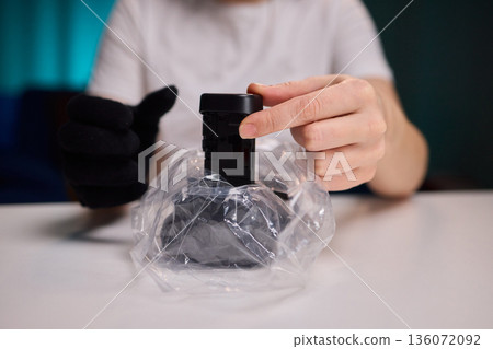 Sealing battery with protective cover, Safely encasing battery for transportation purposes, Carefully wrapping and sealing battery to prevent damage during transit or storage Sealing battery with protective cover, Safely encasing battery for transportation purposes, Carefully wrapping and sealing battery to prevent damage during transit or storage 136072092