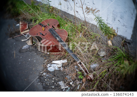 Broken stringed instrument in a ruined place Broken stringed instrument in a ruined place 136074143