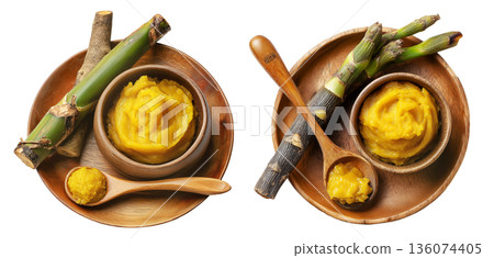 Pandanus fruit paste in wooden bowl with fresh pandanus leaves and fruit on wooden plate, isolated on white transparent background Pandanus fruit paste in wooden bowl with fresh pandanus leaves and fruit on wooden plate, isolated on white transparent background 136074405