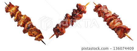 Anticuchos grilled beef meat skewer isolated on white transparent background, concept of South American barbecue cuisine Anticuchos grilled beef meat skewer isolated on white transparent background, concept of South American barbecue cuisine 136074409