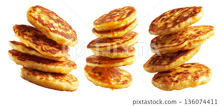 Cachapas sweet corn pancakes flying in air, isolated on white background, concept of South American cuisine Cachapas sweet corn pancakes flying in air, isolated on white background, concept of South American cuisine 136074411