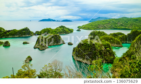 Beautiful views of the Raja Ampat Islands, West Papua, Indonesia Beautiful views of the Raja Ampat Islands, West Papua, Indonesia 136075629