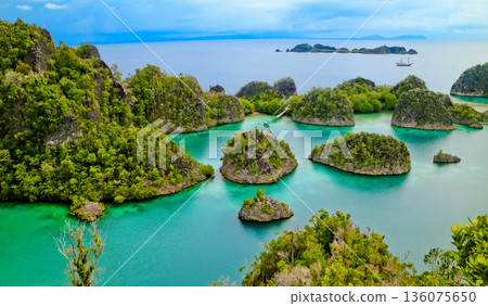 Beautiful views of the Raja Ampat Islands, West Papua, Indonesia Beautiful views of the Raja Ampat Islands, West Papua, Indonesia 136075650