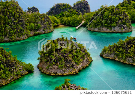 Beautiful views of the Raja Ampat Islands, West Papua, Indonesia Beautiful views of the Raja Ampat Islands, West Papua, Indonesia 136075651