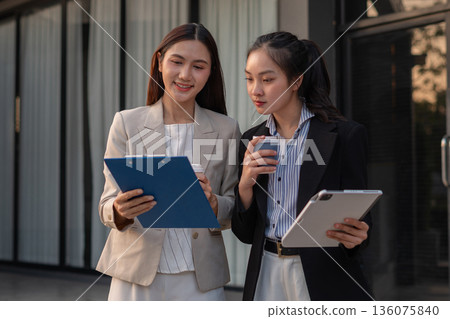 Project manager working and update tasks with milestones progress planning and professional investor working new start up project. 136075840