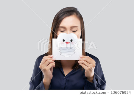 Dental Implant Concept with Woman Holding Tooth Illustration 136076934