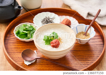 Warm white rice porridge with pickled plum and mitsuba Warm white rice porridge with pickled plum and mitsuba 136077150