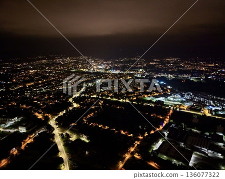 City Skyline Glow At Night, Illuminated Urban Horizon Capturing Evening Allure For Travel Promotion 136077322