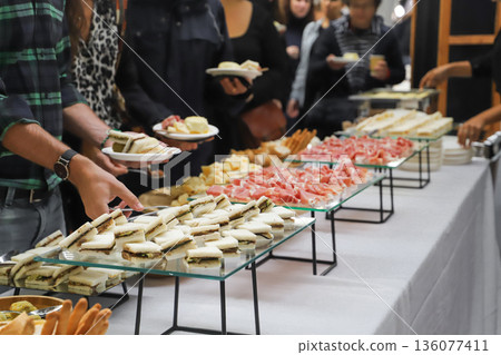 catering buffet for events with food and drinks. close-up of a buffet with appetizers 136077411