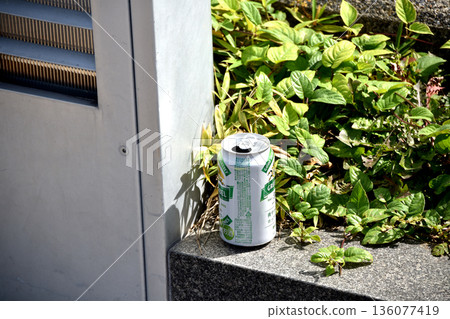 Empty cans discarded on the side of the aisle Empty cans discarded on the side of the aisle 136077419