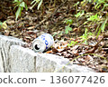 A discarded aluminum can 136077426