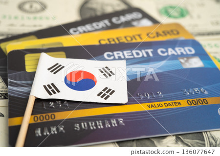 South Korea flag on credit card, finance economy trading shopping online business. South Korea flag on credit card, finance economy trading shopping online business. 136077647