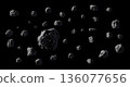Asteroids or meteorites on black. 136077656